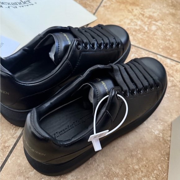 Alexander McQueen Black Leather Sneakers - Picture 1 of 4